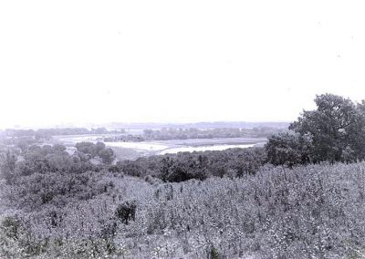 black and white photo of valley landscape